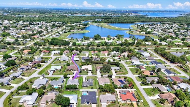 3204 SE Otis Ln, Port Saint Lucie, FL 34984 - aerial view of property's location with a nearby body of water and nearby suburban area