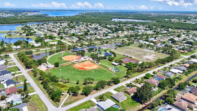 3204 SE Otis Ln, Port Saint Lucie, FL 34984 - aerial view of property's location with a large body of water and nearby suburban area