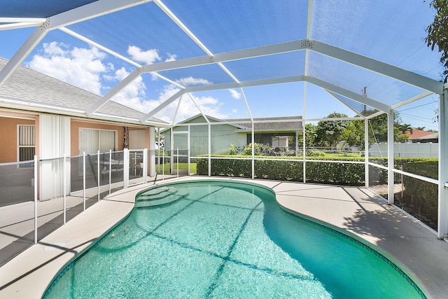 3204 SE Otis Ln, Port Saint Lucie, FL 34984 - view of pool with a patio area and a lanai
