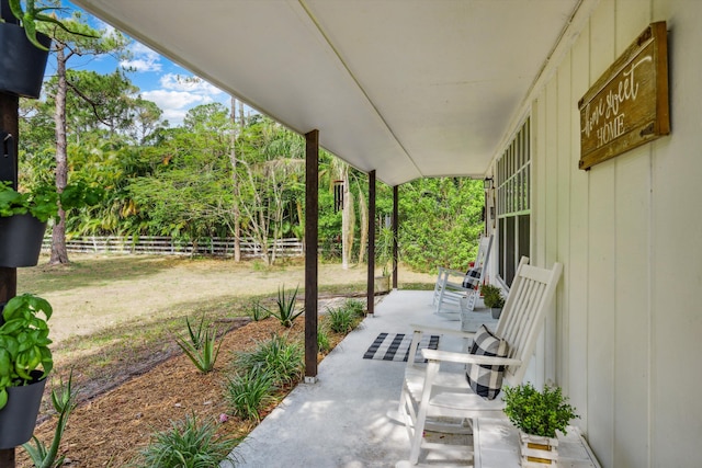 12389 186th St N, Jupiter, FL 33478 - view of patio / terrace featuring fence