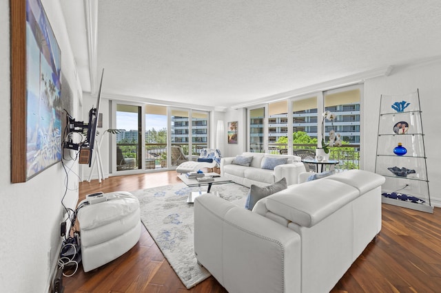 901 E Camino Real Unit 5C, Boca Raton, FL 33432 - living room with a textured ceiling, floor to ceiling windows, and wood finished floors