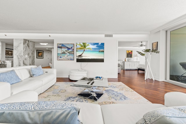 901 E Camino Real Unit 5C, Boca Raton, FL 33432 - living area with wood finished floors, baseboards, crown molding, and a ceiling fan