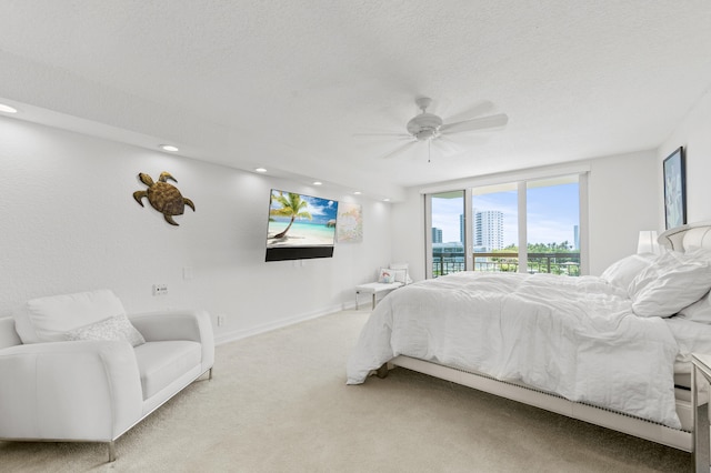901 E Camino Real Unit 5C, Boca Raton, FL 33432 - carpeted bedroom featuring access to exterior, a ceiling fan, baseboards, and recessed lighting