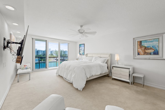 901 E Camino Real Unit 5C, Boca Raton, FL 33432 - bedroom featuring light carpet, baseboards, access to outside, ceiling fan, and recessed lighting