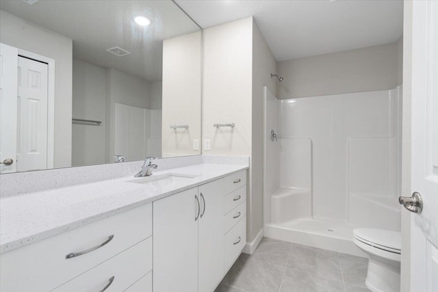 15 Jacaranda Ln, Port Saint Lucie, FL 34952 - full bath featuring toilet, tile patterned flooring, a shower, vanity, and recessed lighting