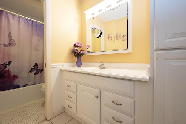 915 Savannas Point Dr Unit E, Fort Pierce, FL 34950 - bathroom featuring vanity, tile patterned floors, toilet, and shower / bath combo with shower curtain