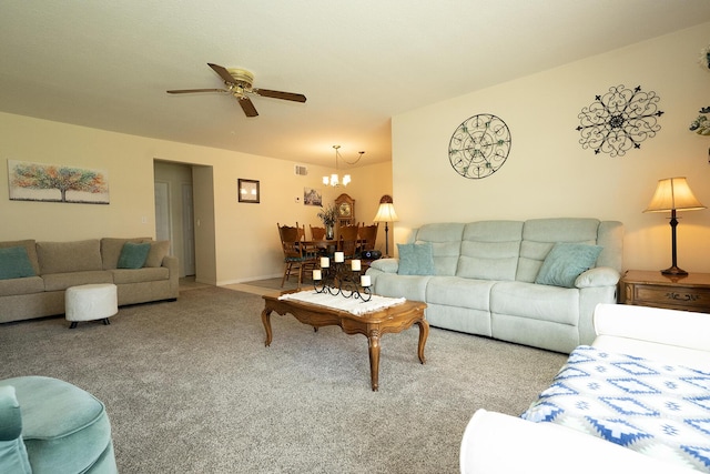 915 Savannas Point Dr Unit E, Fort Pierce, FL 34950 - living area with a chandelier, a ceiling fan, and carpet