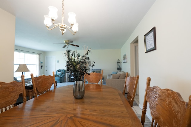 915 Savannas Point Dr Unit E, Fort Pierce, FL 34950 - dining room with a chandelier and ceiling fan