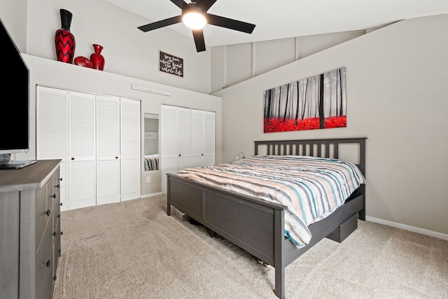 1176 Shibumy Cir Unit C, West Palm Beach, FL 33415 - bedroom with carpet, a towering ceiling, multiple closets, baseboards, and a ceiling fan