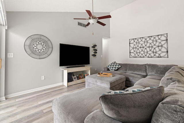 1176 Shibumy Cir Unit C, West Palm Beach, FL 33415 - living area with ceiling fan, light wood-style flooring, baseboards, and high vaulted ceiling