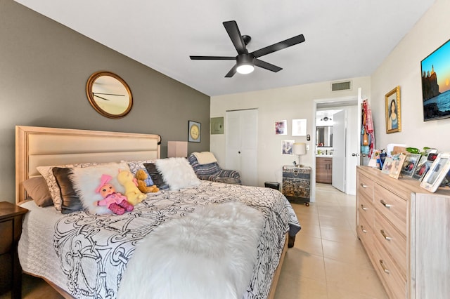 bedroom featuring light tile patterned floors and a ceiling fan