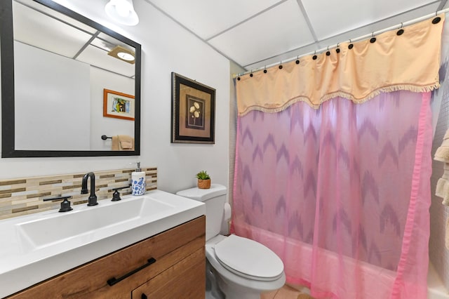 full bath featuring toilet, decorative backsplash, vanity, and shower / bath combination with curtain