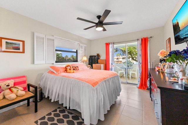 bedroom with access to outside, light tile patterned flooring, and a ceiling fan