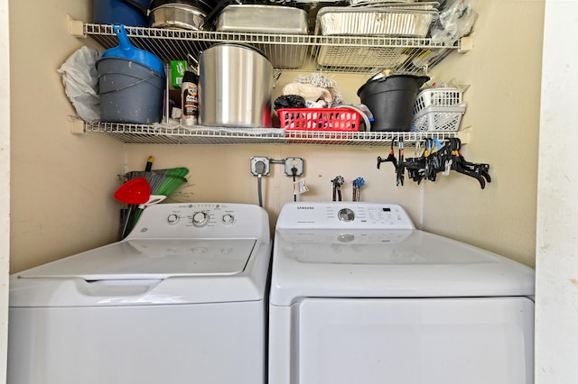 laundry area featuring washing machine and dryer