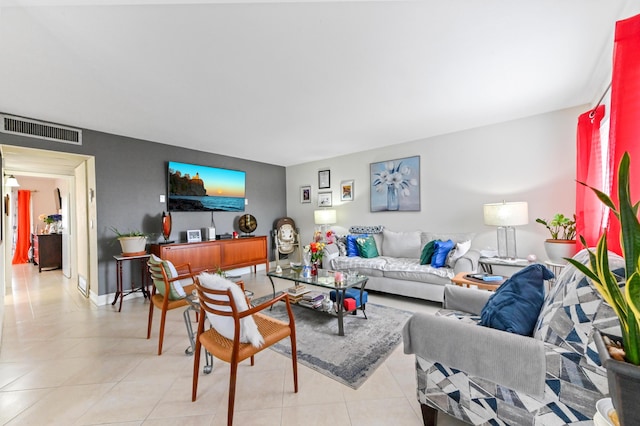living area featuring light tile patterned floors