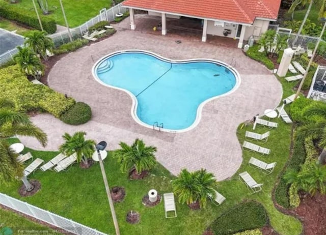 community pool with a patio