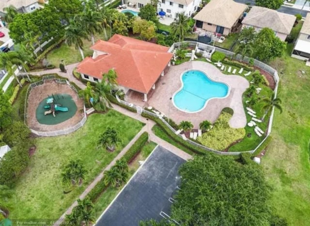 view of property location with a pool
