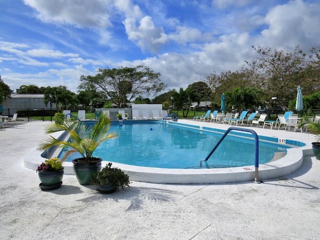 797 N Dr Unit A, Delray Beach, FL 33445 - community pool featuring a patio area and fence