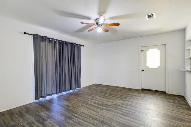 280 NW Airoso Blvd, Port Saint Lucie, FL 34983 - empty room featuring a ceiling fan, wood finished floors, and baseboards