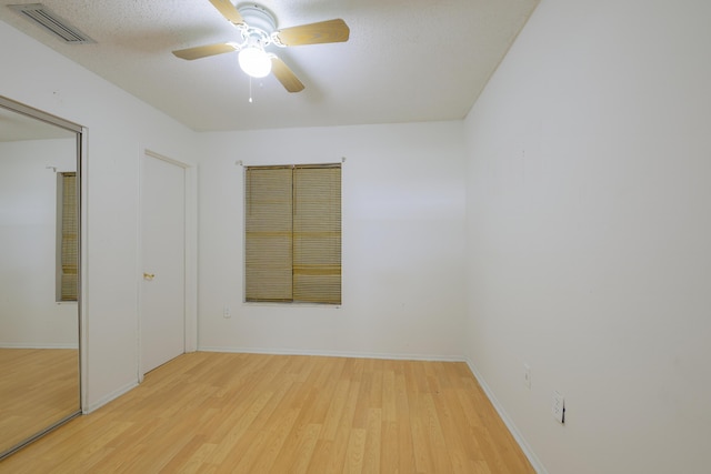 280 NW Airoso Blvd, Port Saint Lucie, FL 34983 - unfurnished bedroom featuring light wood-style floors, baseboards, and a ceiling fan