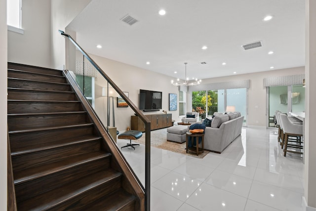 6028 Curie Pl, Palm Beach Gardens, FL 33418 - living area featuring stairway, recessed lighting, light tile patterned floors, and a chandelier