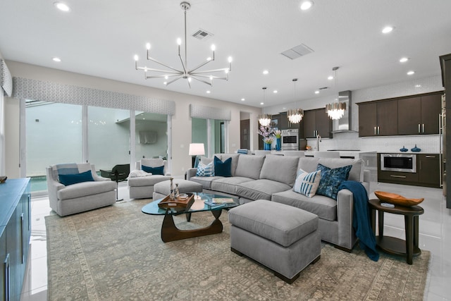 6028 Curie Pl, Palm Beach Gardens, FL 33418 - living room with a chandelier and recessed lighting