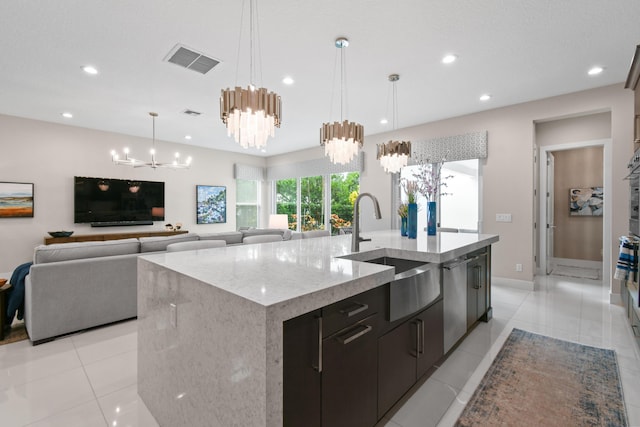 6028 Curie Pl, Palm Beach Gardens, FL 33418 - kitchen with a chandelier, a sink, recessed lighting, stainless steel dishwasher, and a center island with sink