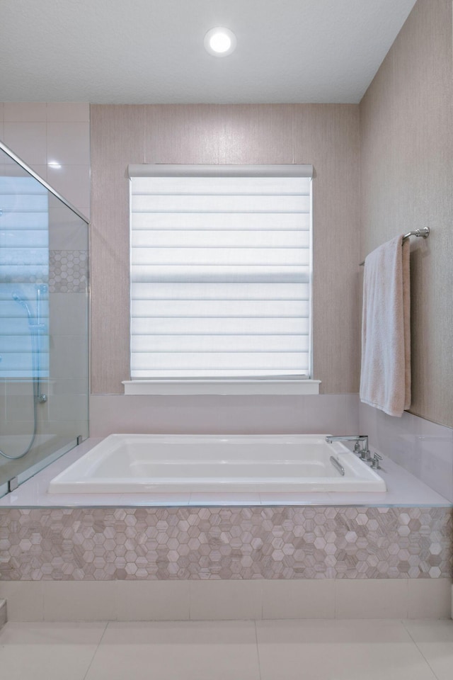 6028 Curie Pl, Palm Beach Gardens, FL 33418 - full bath featuring plenty of natural light, a garden tub, and tile patterned flooring