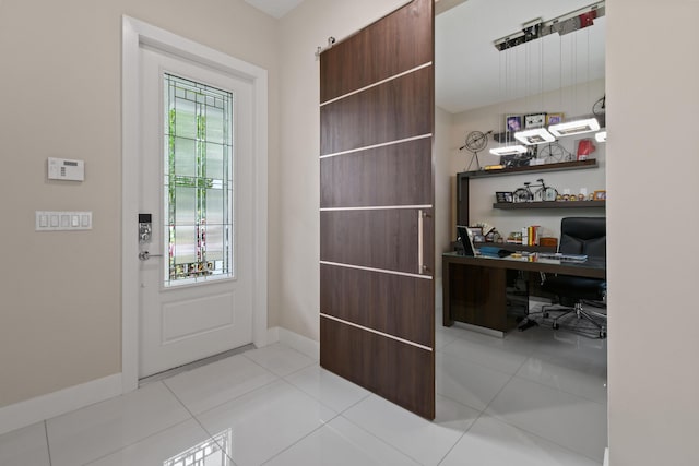 6028 Curie Pl, Palm Beach Gardens, FL 33418 - entryway with an office area, baseboards, and light tile patterned floors