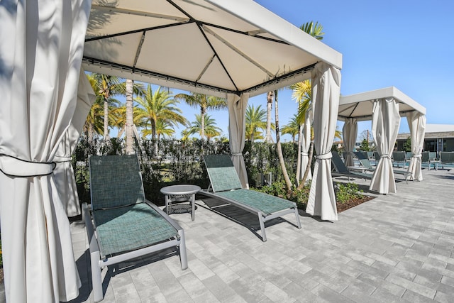 6028 Curie Pl, Palm Beach Gardens, FL 33418 - view of patio featuring a gazebo