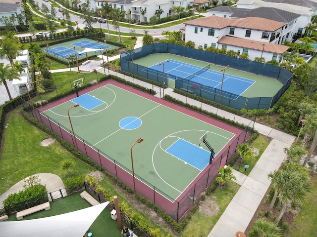 6028 Curie Pl, Palm Beach Gardens, FL 33418 - view of basketball court featuring fence, community basketball court, and a residential view