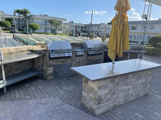3160 Lake Osborne Dr Unit 201, Lake Worth, FL 33461 - view of patio with a residential view