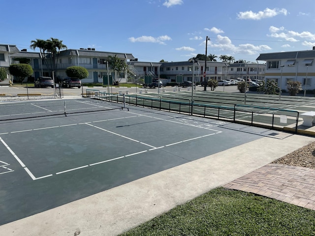3160 Lake Osborne Dr Unit 201, Lake Worth, FL 33461 - view of tennis court featuring a residential view