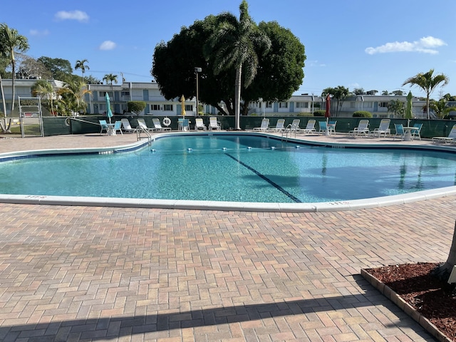 3160 Lake Osborne Dr Unit 201, Lake Worth, FL 33461 - community pool featuring a patio area