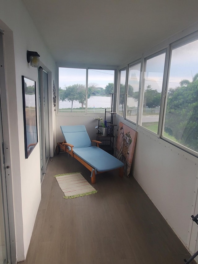 3160 Lake Osborne Dr Unit 201, Lake Worth, FL 33461 - sunroom featuring a water view