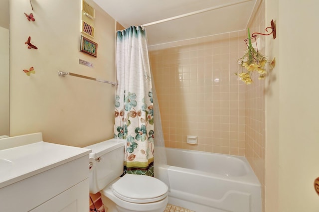 bathroom with toilet, vanity, and shower / bath combo