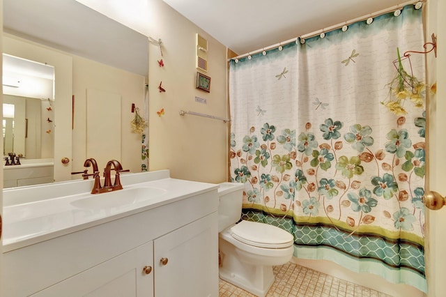 full bath featuring toilet, shower / tub combo, tile patterned flooring, and vanity