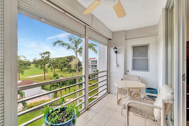 balcony featuring a ceiling fan