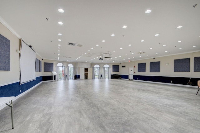 miscellaneous room with ornamental molding, recessed lighting, and baseboards