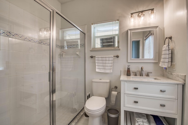 2720 SE Kern Rd, Port Saint Lucie, FL 34984 - bathroom with toilet, vanity, and a shower stall