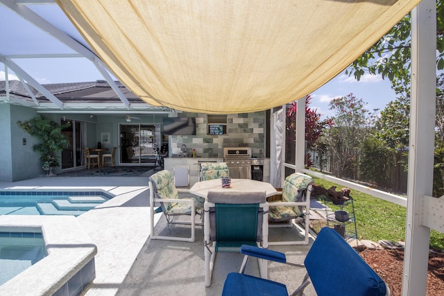 2720 SE Kern Rd, Port Saint Lucie, FL 34984 - view of patio / terrace with exterior kitchen, outdoor dining space, a ceiling fan, and an outdoor pool