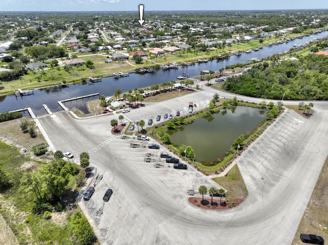 2720 SE Kern Rd, Port Saint Lucie, FL 34984 - aerial view of residential area featuring a nearby body of water