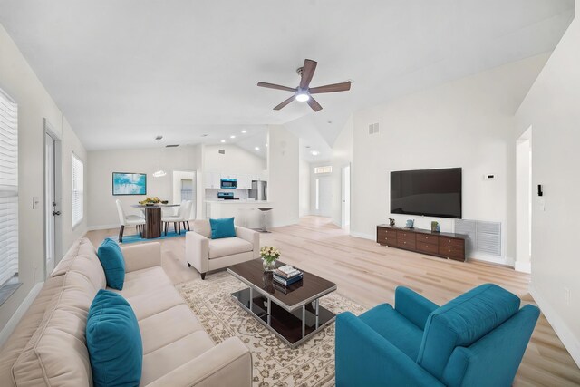 3227 SW Foremost Dr, Port Saint Lucie, FL 34953 - living area with lofted ceiling, a ceiling fan, wood finished floors, baseboards, and recessed lighting