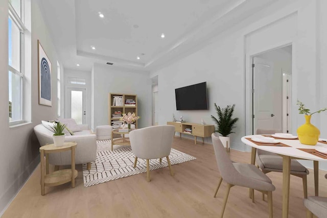 228 SE Via Sangro, Port Saint Lucie, FL 34987 - living room featuring light wood finished floors, recessed lighting, baseboards, and a raised ceiling