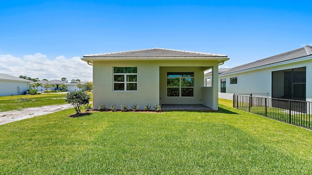 back of property with stucco siding