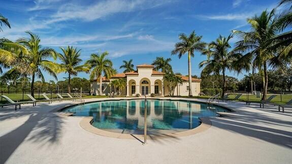 community pool with a patio area