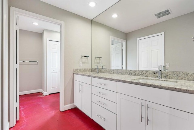 6728 Spanish Lake Blvd, Fort Pierce, FL 34951 - full bathroom with baseboards, double vanity, and recessed lighting