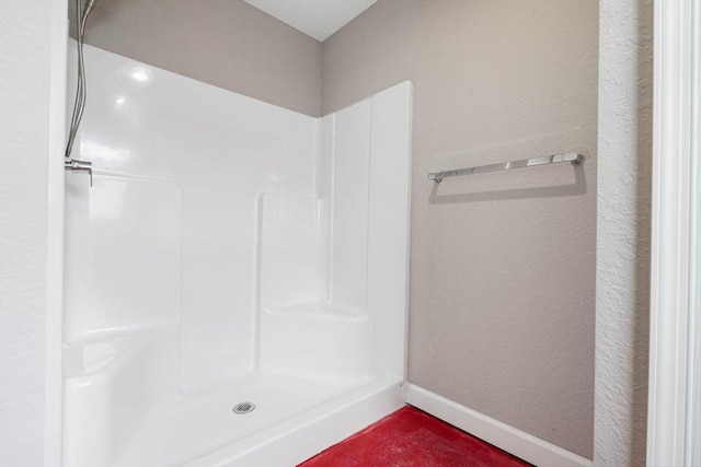 6728 Spanish Lake Blvd, Fort Pierce, FL 34951 - full bath featuring a shower, baseboards, and a textured wall