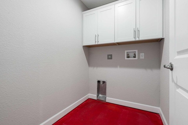 6728 Spanish Lake Blvd, Fort Pierce, FL 34951 - washroom with hookup for an electric dryer, baseboards, hookup for a washing machine, cabinet space, and dark carpet
