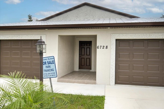 6728 Spanish Lake Blvd, Fort Pierce, FL 34951 - view of front of home with stucco siding